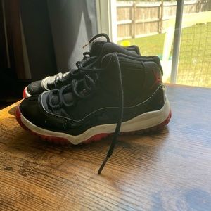Jordan Bred 11. 6.5/10. Worn but still clean shoe with no heel rub. Size 13C.
